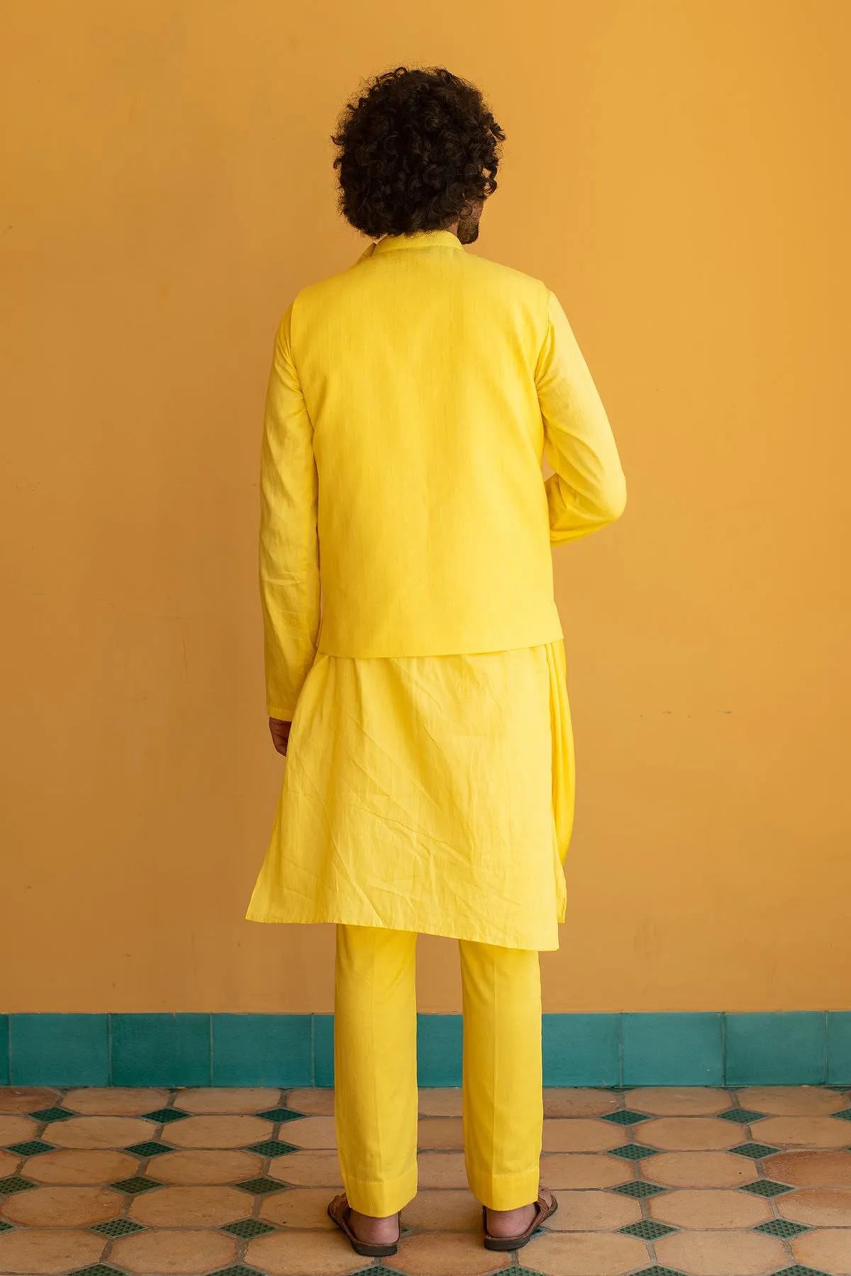 MEHERZAD - Embroidered  Yellow Nehru Jacket Paired with Drape Kurta & Trouser set