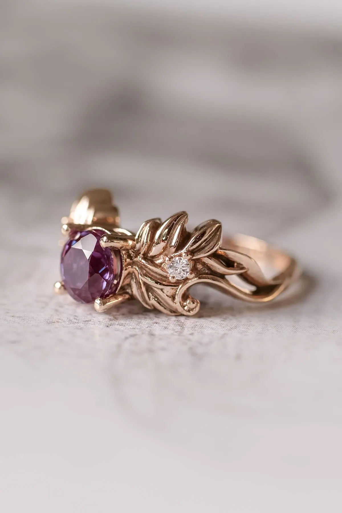 Nature themed engagement ring with alexandrite, colour changing gemstone