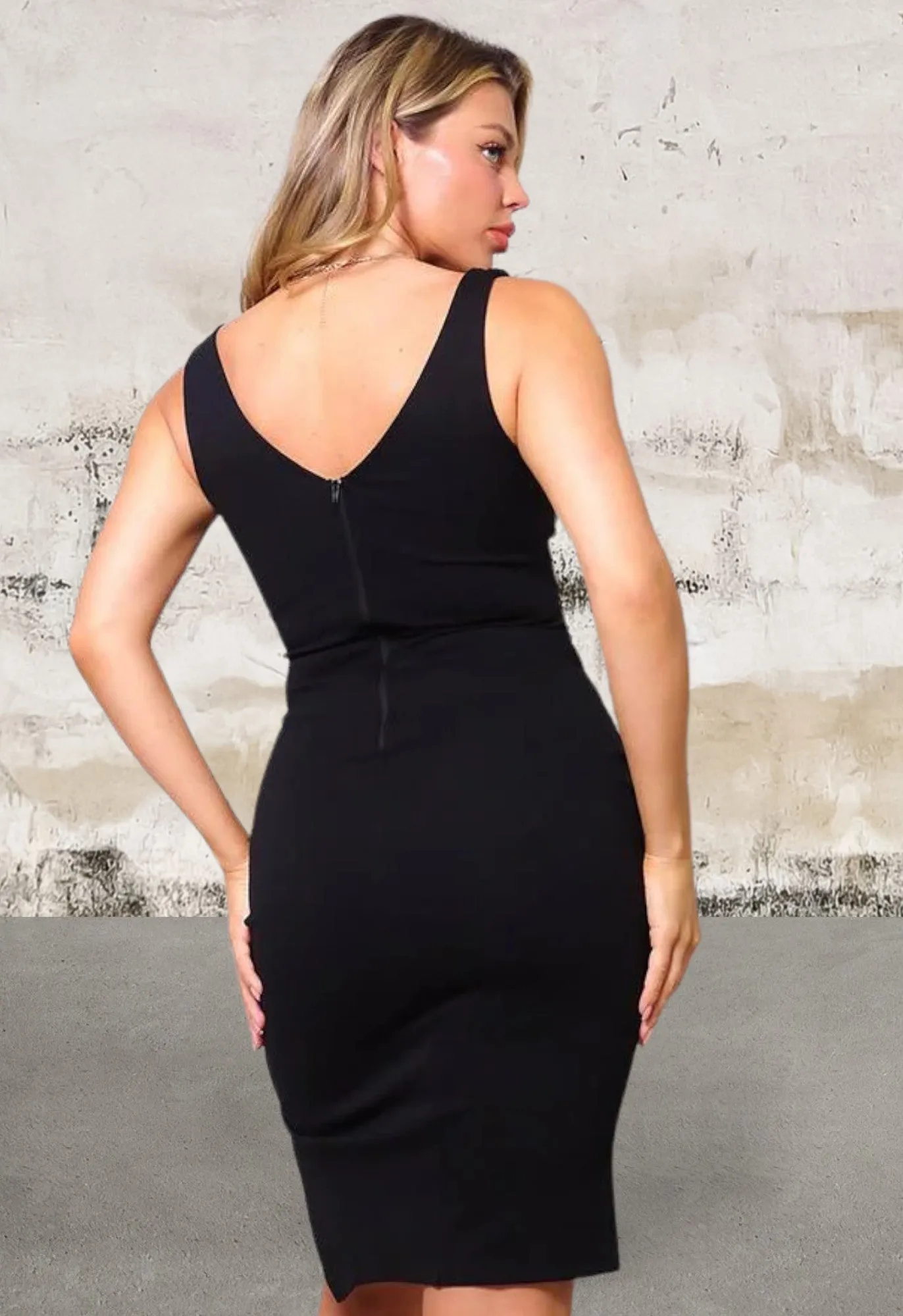 Sleeveless deep v neckline dress with front slit